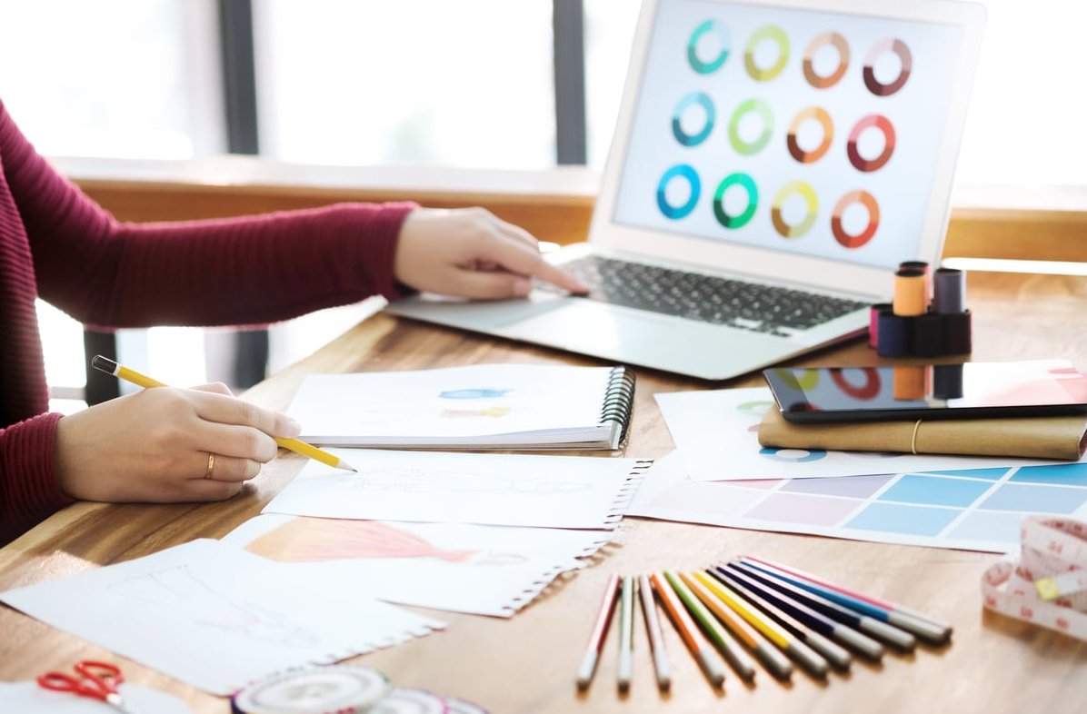 web designer using laptop