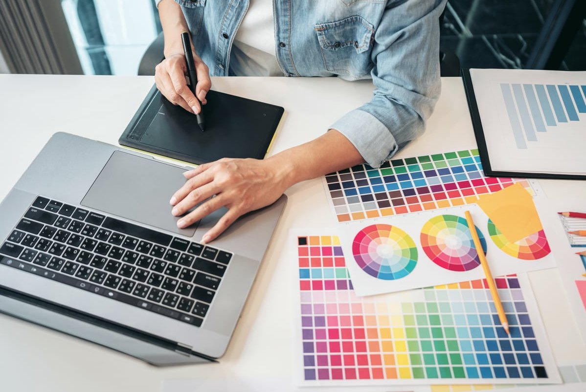 web designer using laptop
