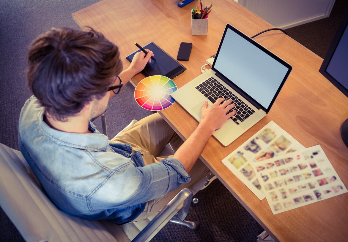 web designer using laptop